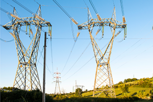 Two transmission lines on grassy hill_Canva.png