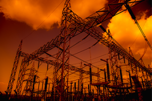 Power substation against orange sky_Canva.png