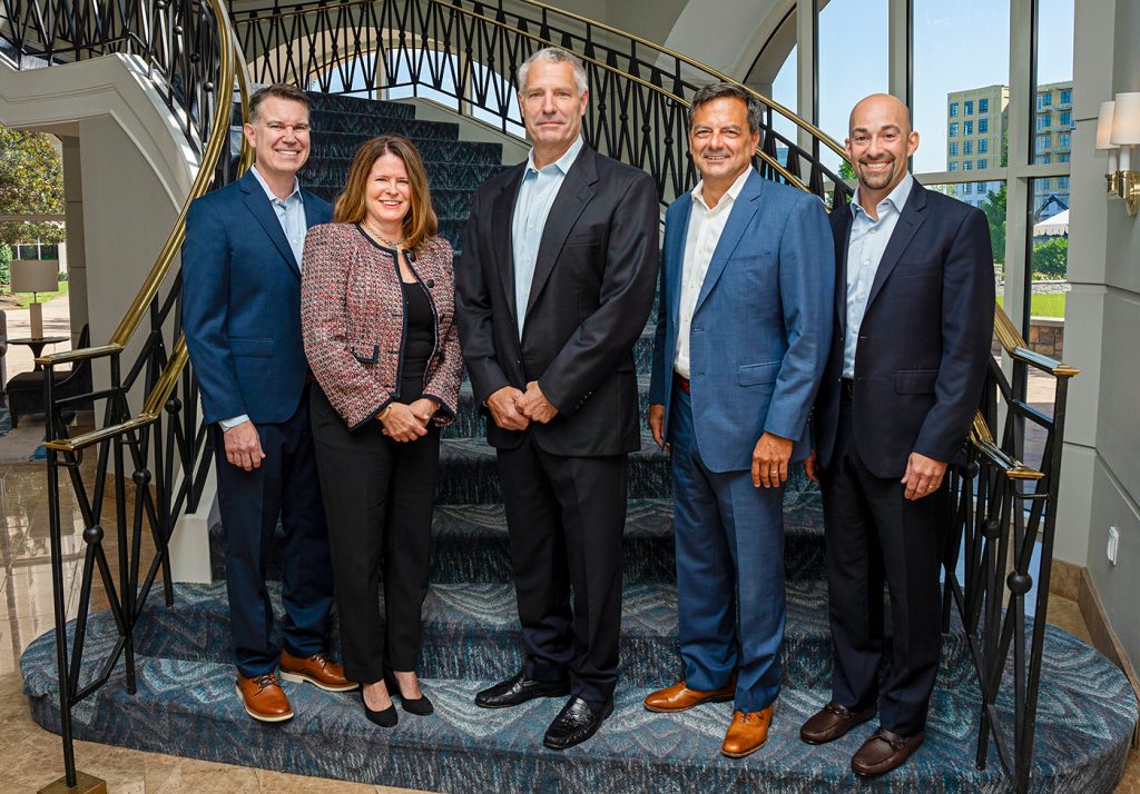 ScottMadden's Leadership team featuring (from left) Jerred Crosby, Courtney Jackson, Brad Kitchens, Brad DeMent, and Andy Flores.